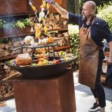 Guy Weyts places the skewers with vegetables on the Ofyr.jpeg